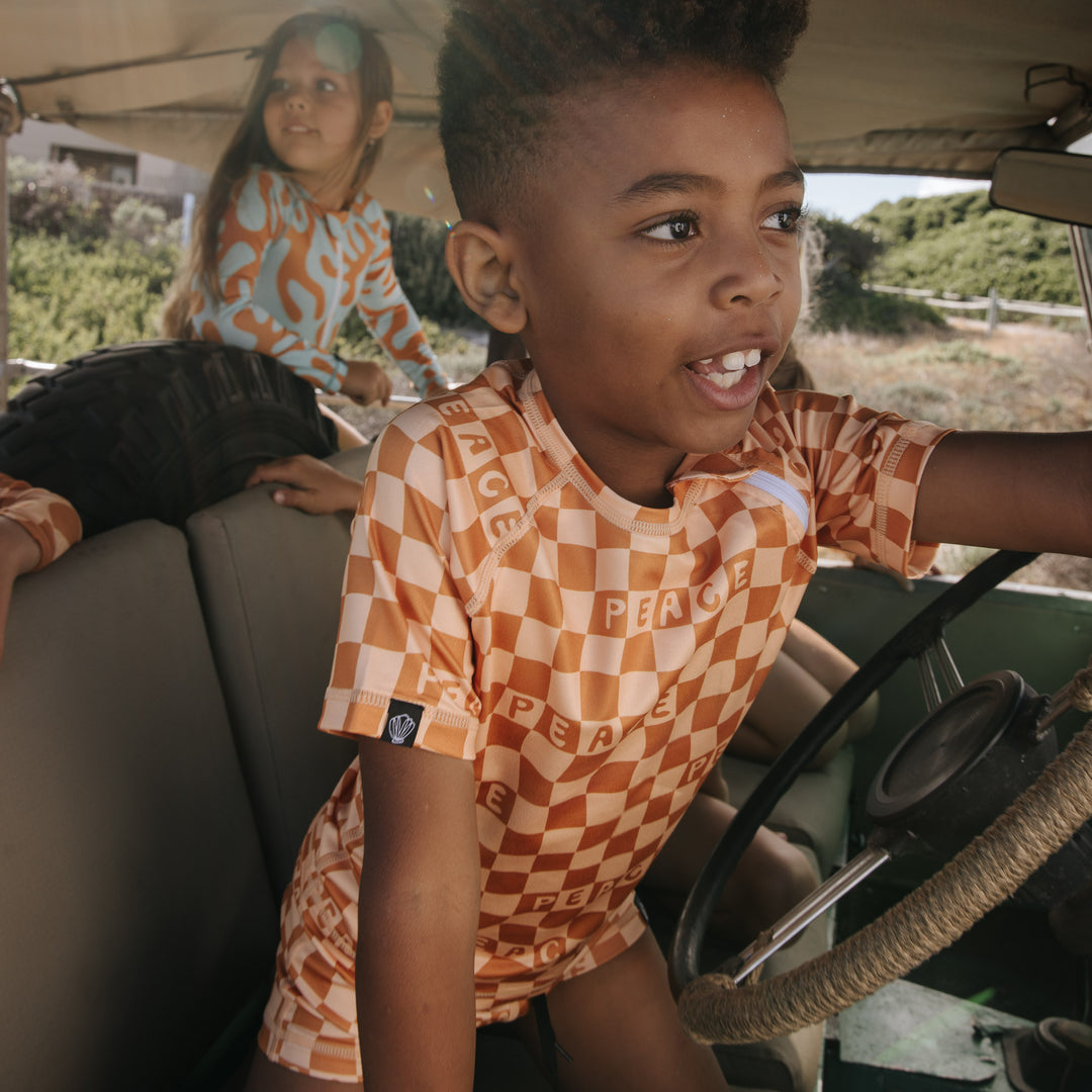 CHECKERED PEACE SWIMSHORT